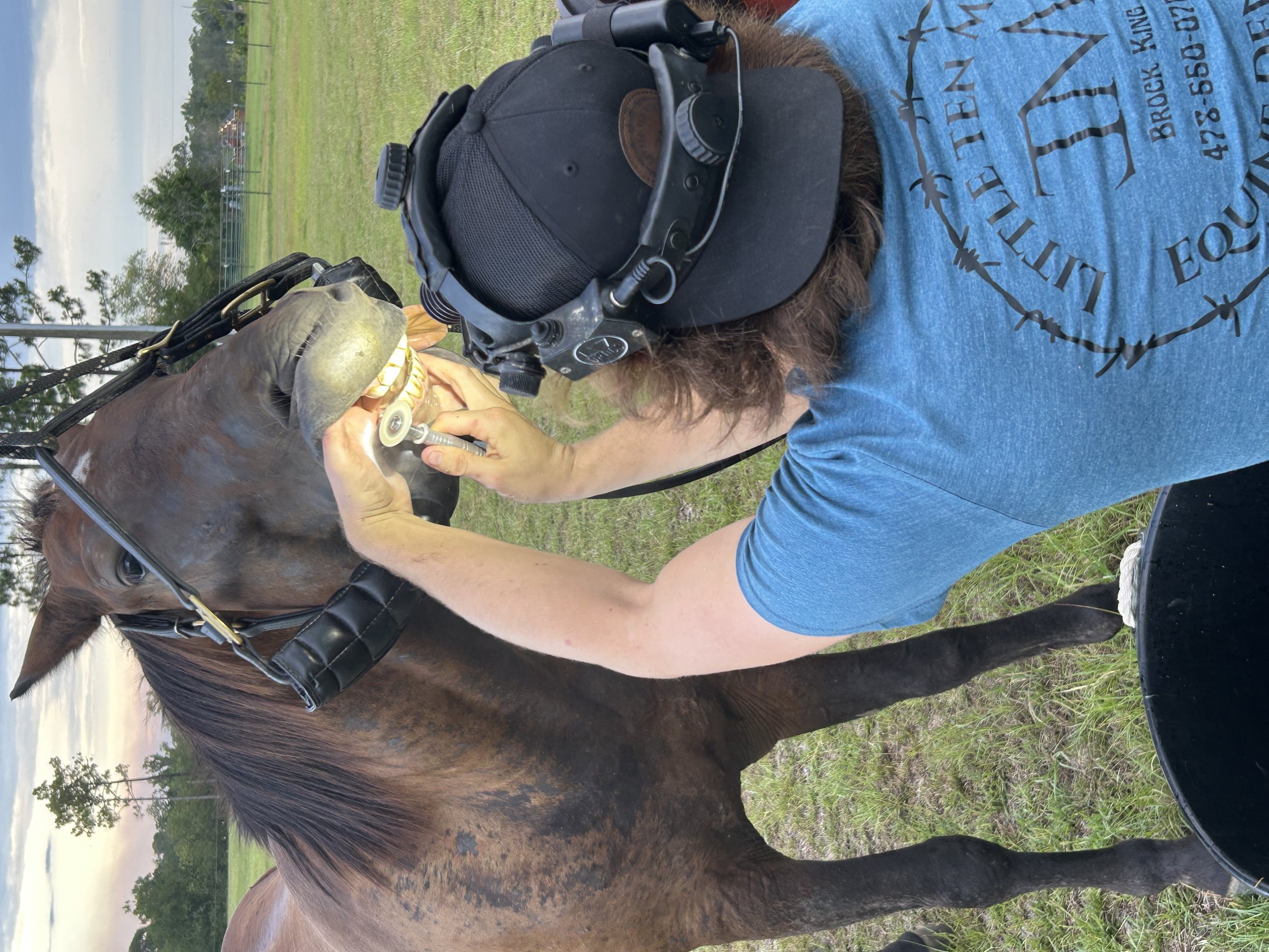 Examining the back teeth with a headlamp
